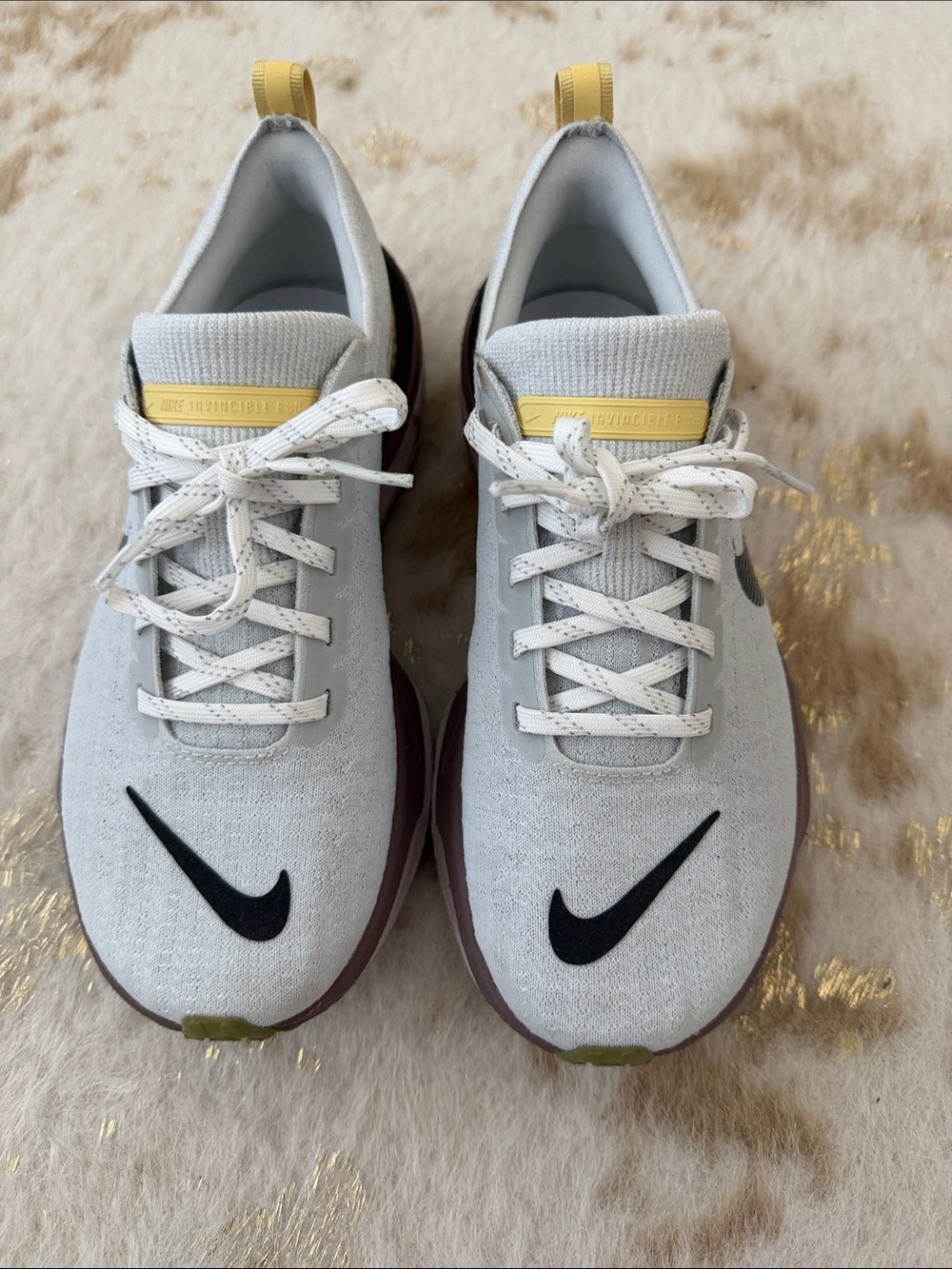 Nike Women’s Light Gray Running Sneakers with Black Swoosh